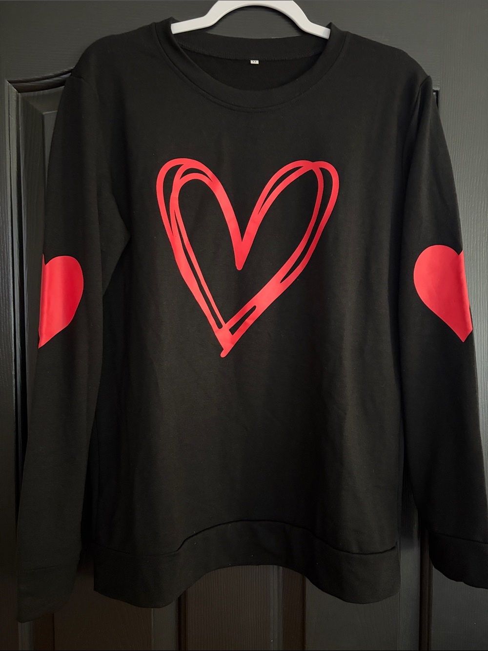 Black Crewneck Sweater with Red Heart Graphic